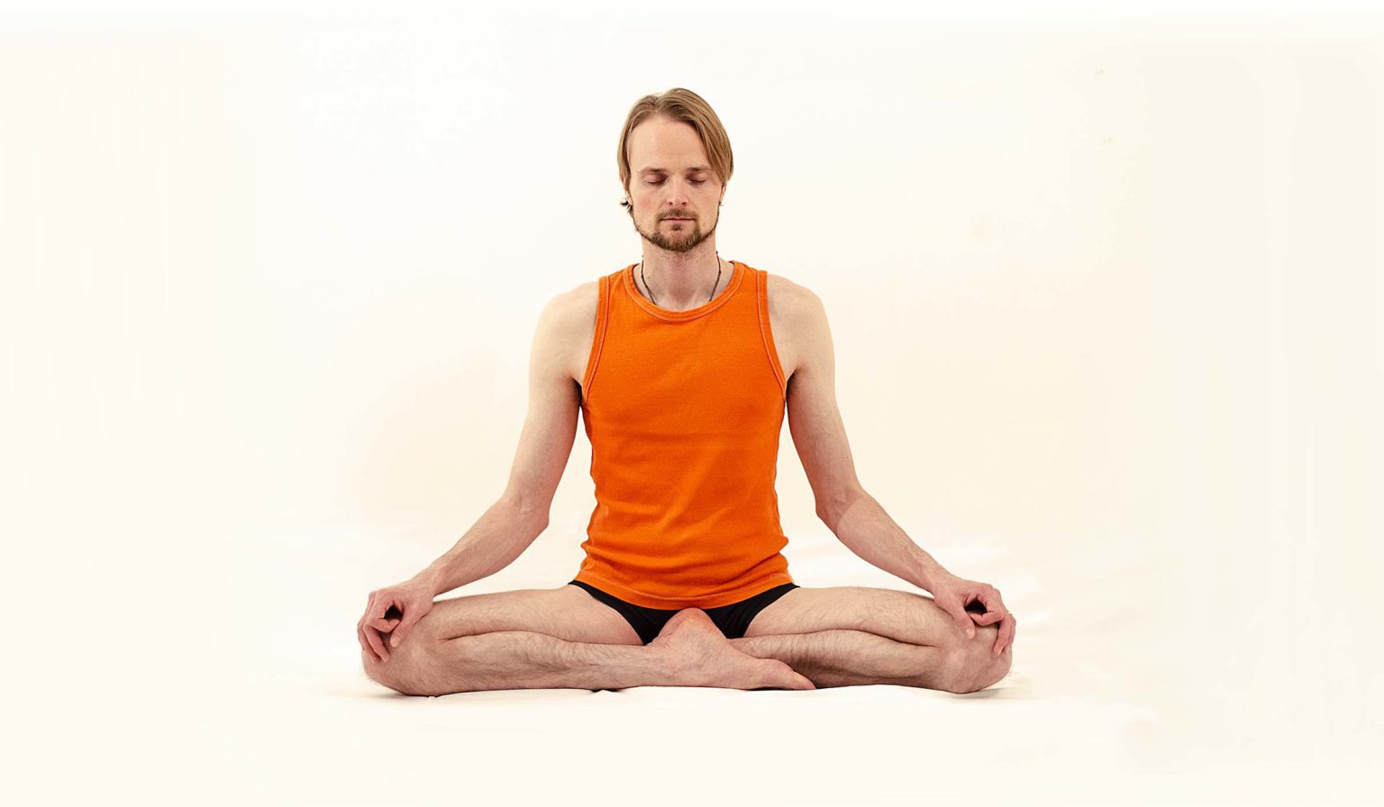 young Asian man coach internet video online training yoga instructor modern  laptop screen meditate Sukhasana posture relax breathe easy seat pose gym  healthy lifestyle at home concept. 11678750 Stock Photo at Vecteezy