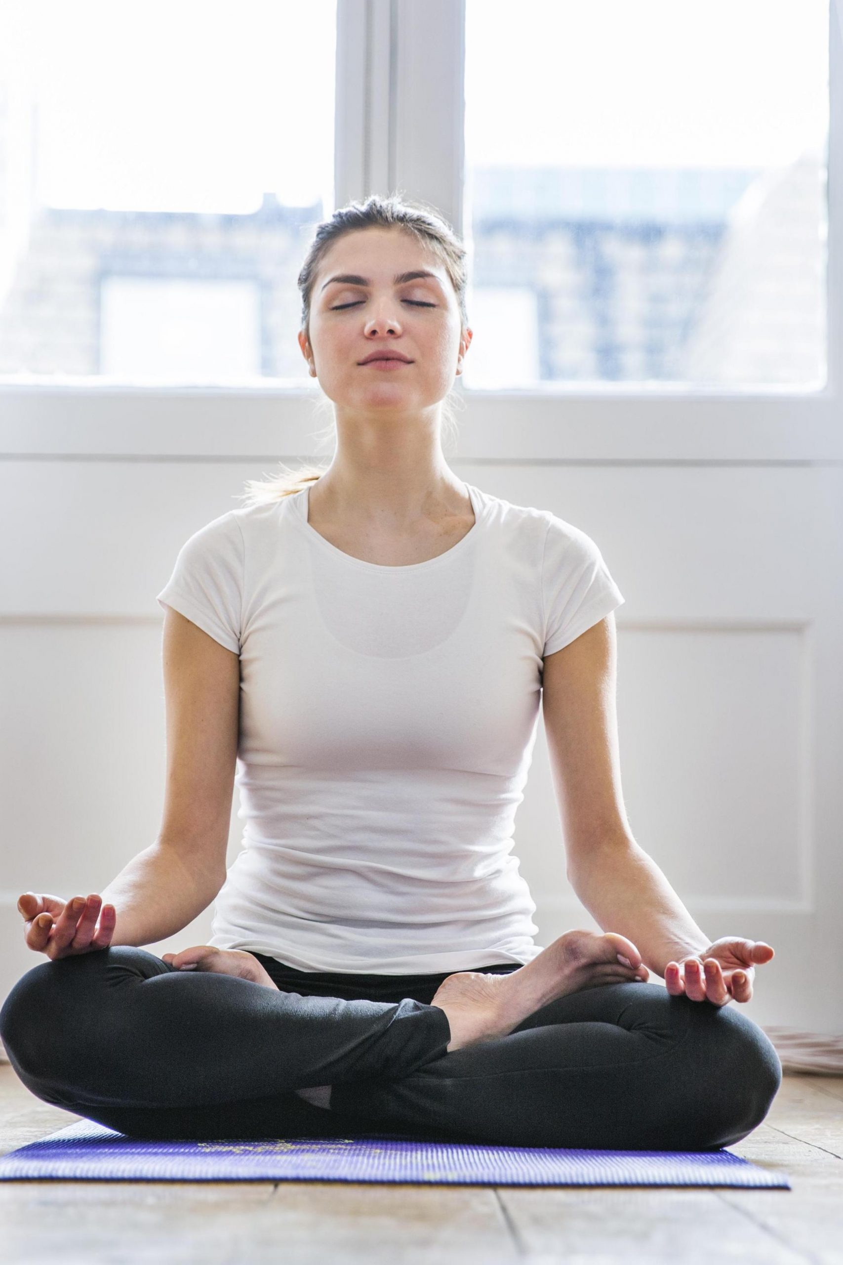 A women doing meditation