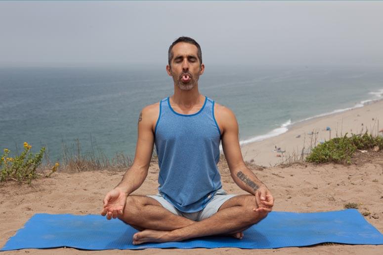 A man Do Yoga asanas
